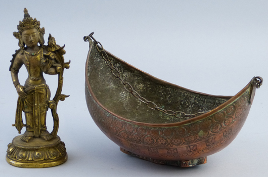 A 'job lot' comprising a copper bowl and a cast brass figure that together confounded a presale estimate of £200-£300 to fetch £11,100 ($16,835) at Dee Atkinson & Harrison's Driffield rooms in East Yorkshire on Feb. 15. It was the deity that did it. Image courtesy Dee Atkinson & Harrison.